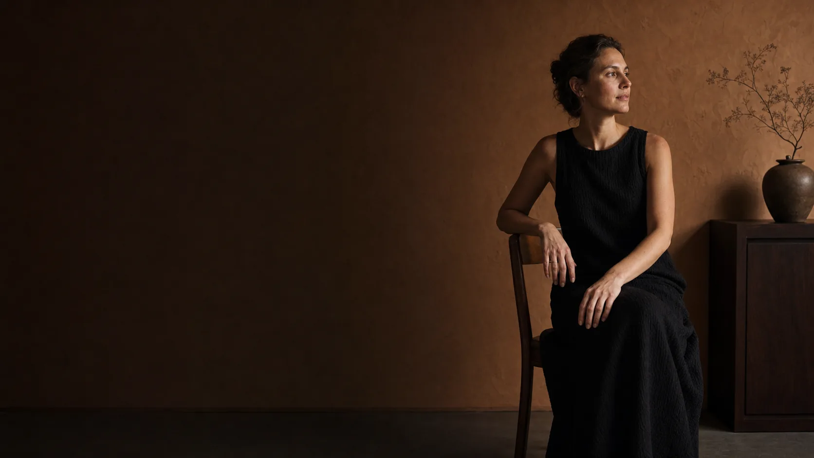 A quiet fashion portrait in warm window light